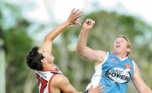 Bay Power’s Chris Tapper (right) leaps into action to contest the ball at the bounce in the clash with Brothers Bulldogs. Bay Power’s Chris Tapper (right) leaps into action to contest the ball at the bounce in the clash with Brothers Bulldogs.